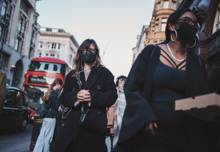 Women wearing face masks on London's busy Oxford Street