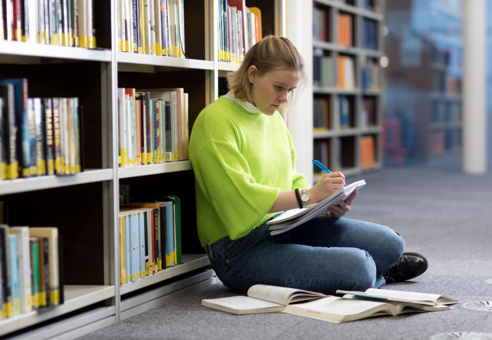 Student sitting in the library