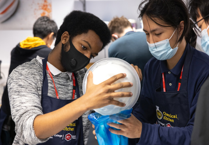 Students making meringues during a Chemical Kitchen session