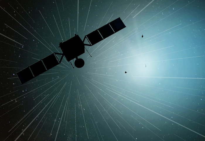 Illustration of a spacecraft and two smaller probes near a comet