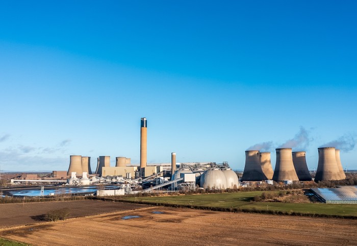 A landscape panorama image of Drax Power Station in North Yorkshire with Biomass fuel storage tanks and carbon capture capabilities.