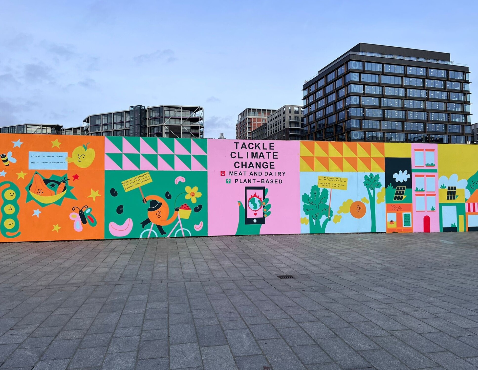 Completed mural 'eat less meat and dairy' in Nine Elms, London