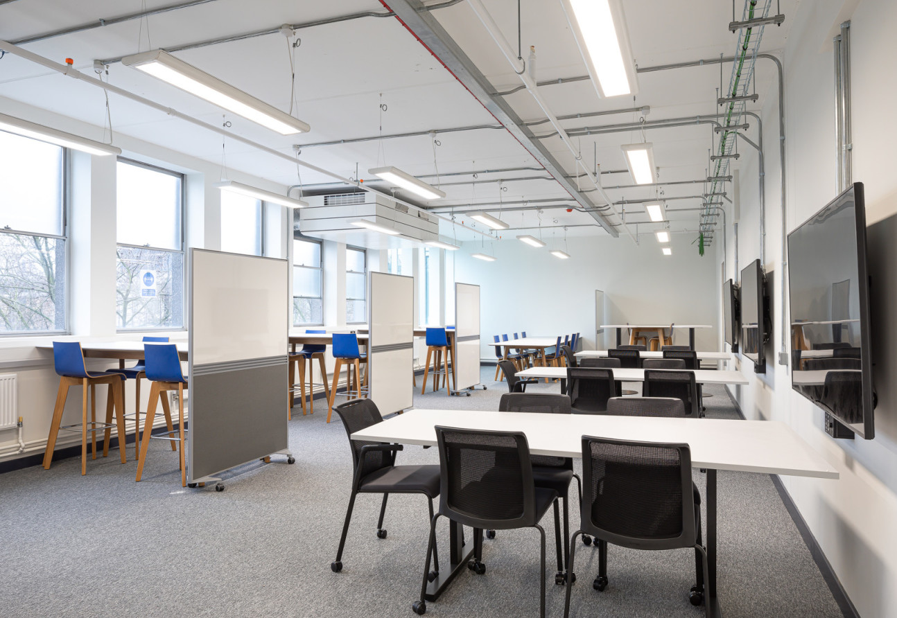 New facilities in Chemistry Level 5&6 - groups of desks with chairs and partitioned off desks and stools