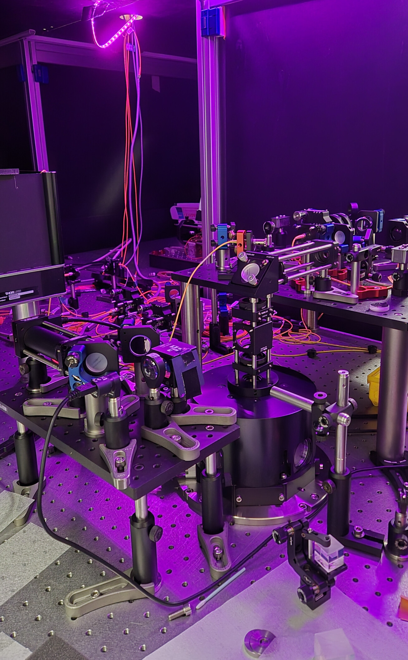 Optics and other equipment in purple light
