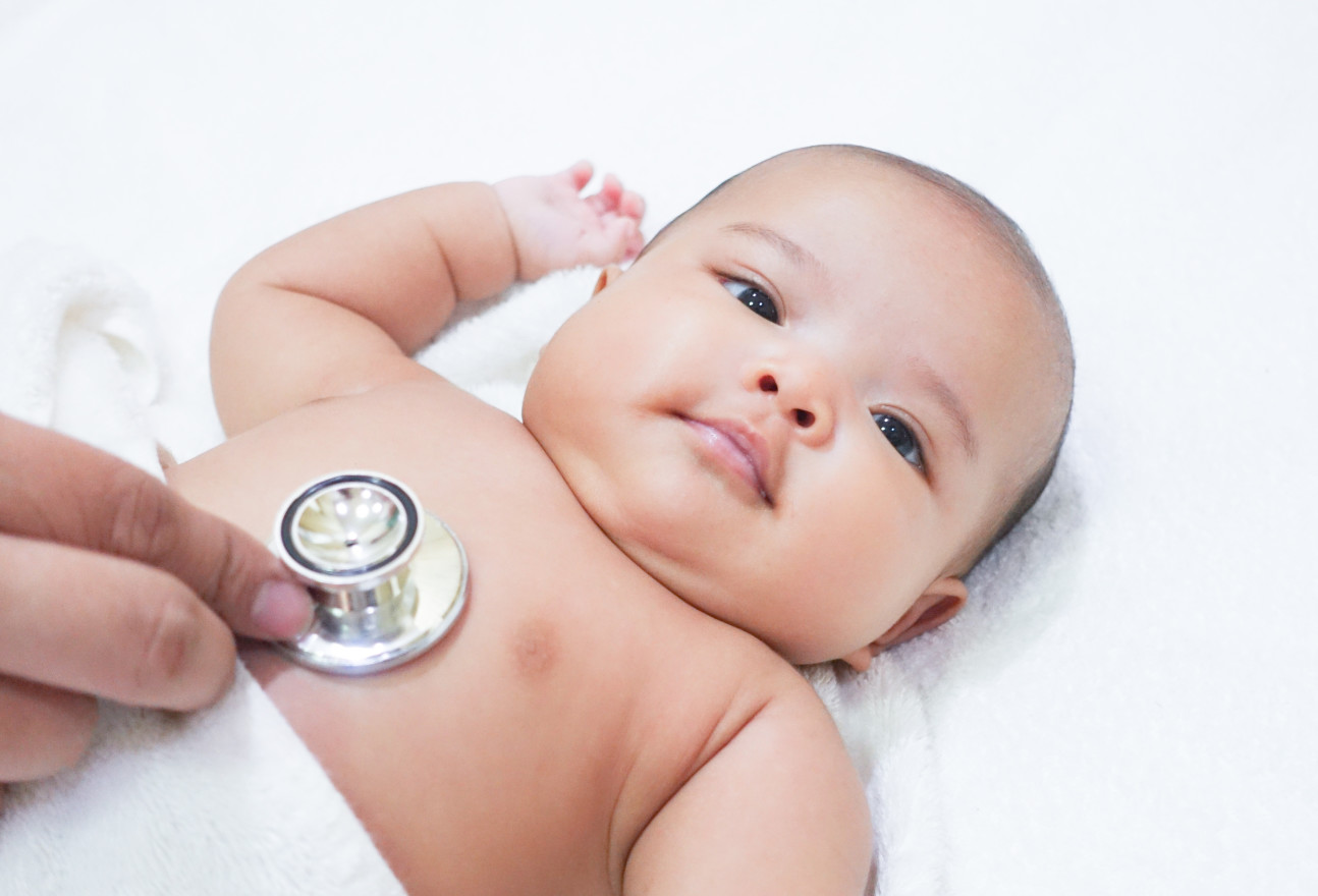 A baby with a stethoscope