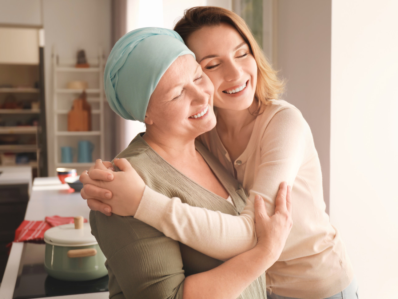 cancer patient and a woman hugging