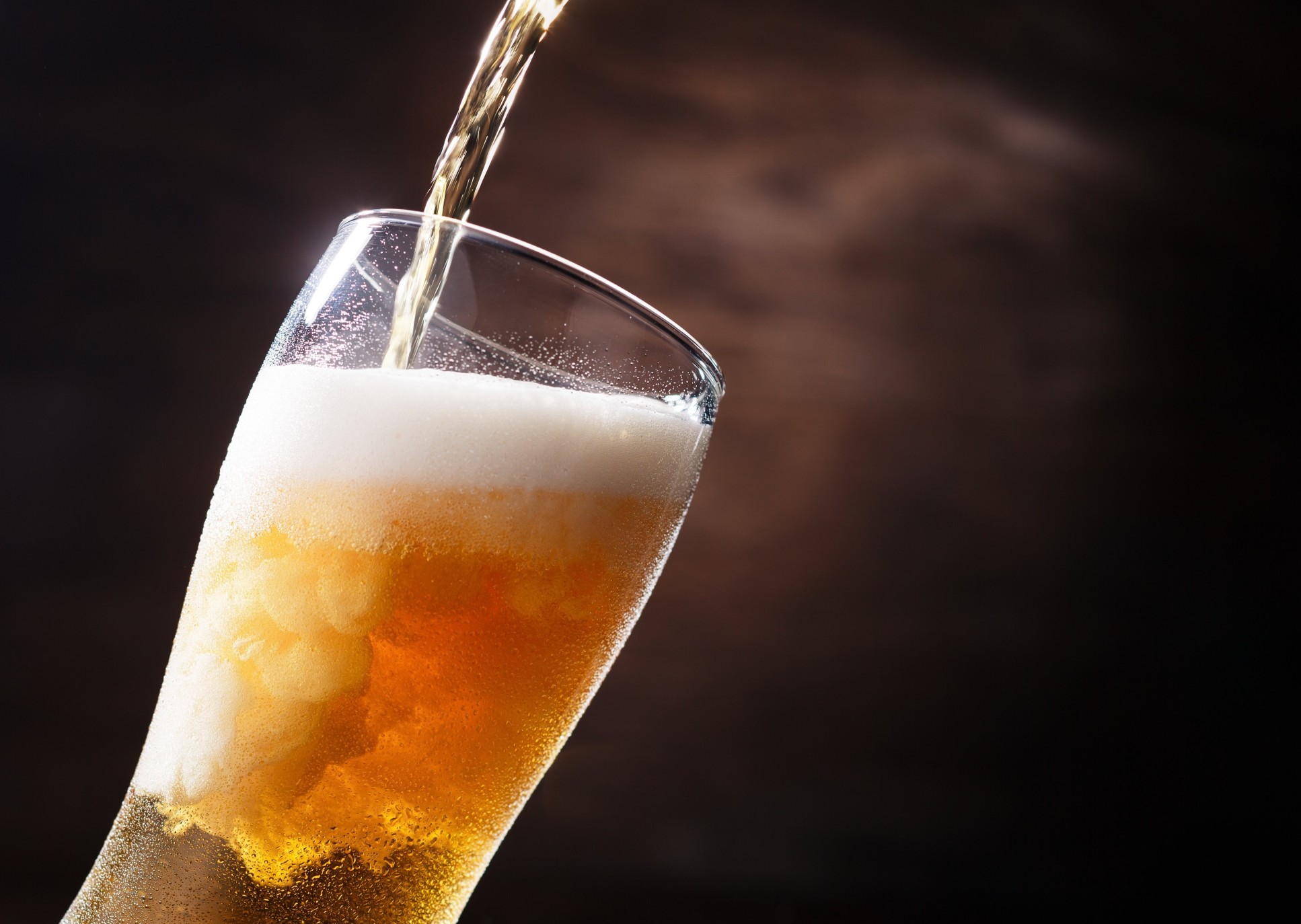 A pint of beer being poured