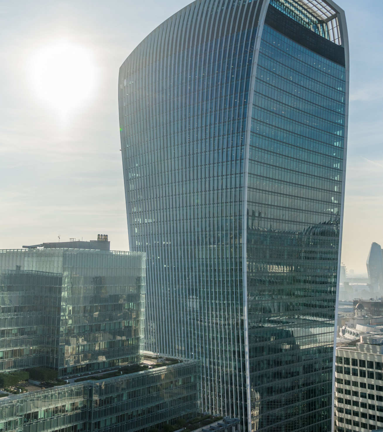 Photo of 20 Fenchurch Street, with sun looming behind it