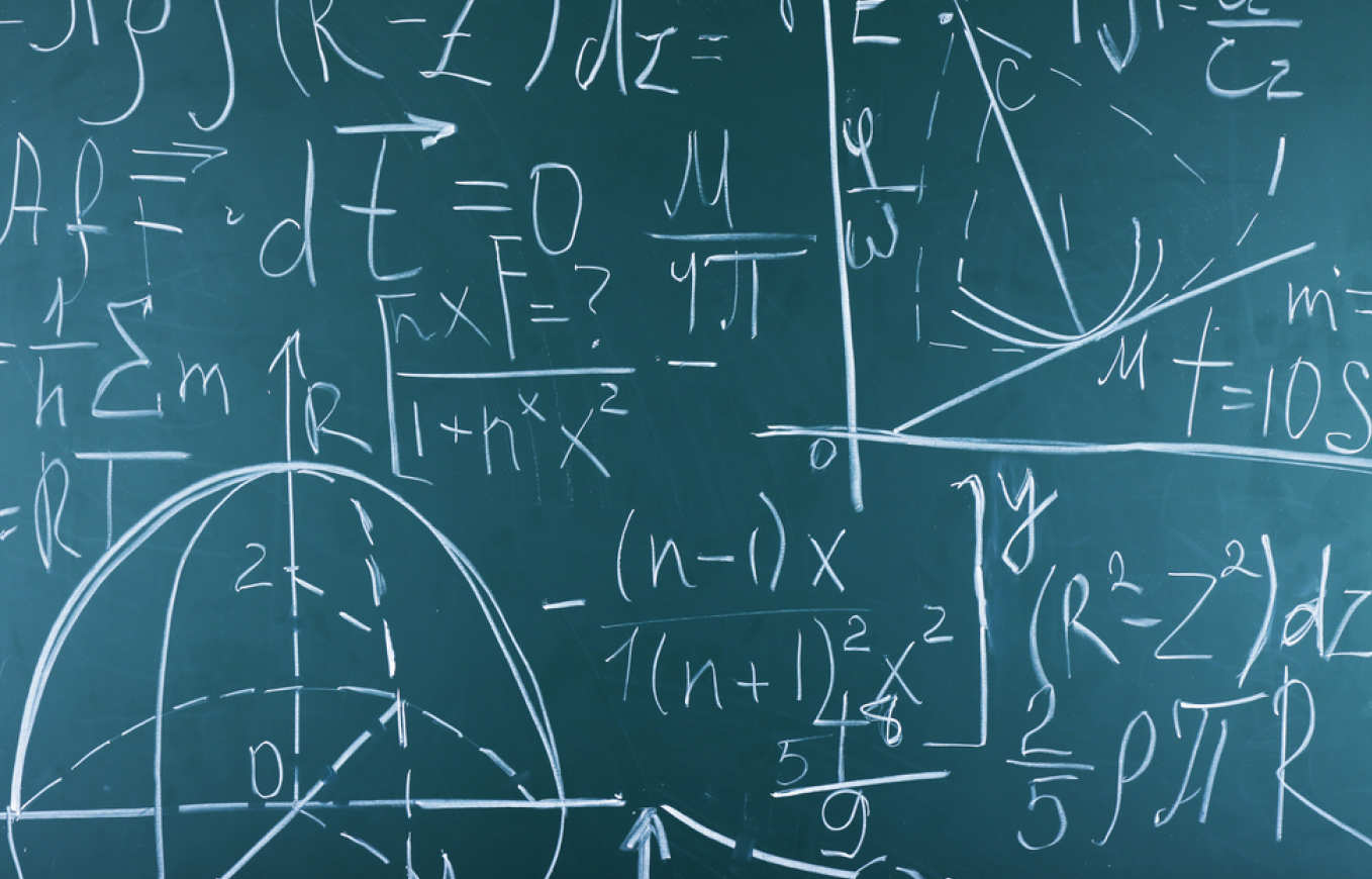 Mathematical equations on a blackboard