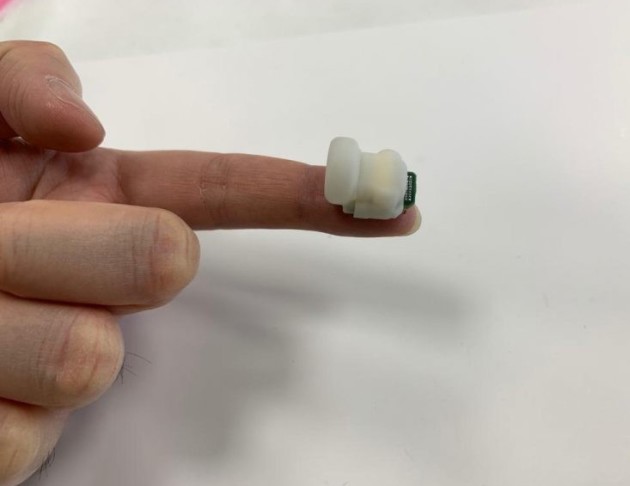 TaiNi device on a human fingertip