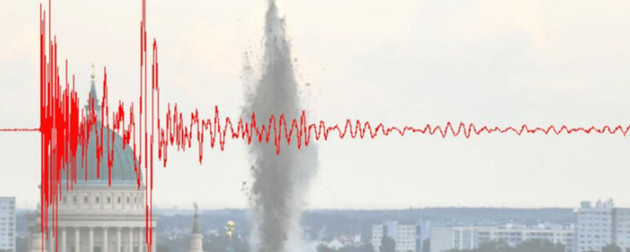 Seismic trace in a red line, overlaying bomb explosion