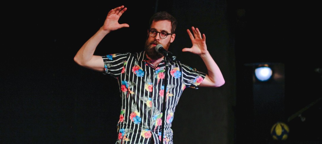 Dan Simpson, Imperial College London Poet in Residence, performing one of his poems at a live event