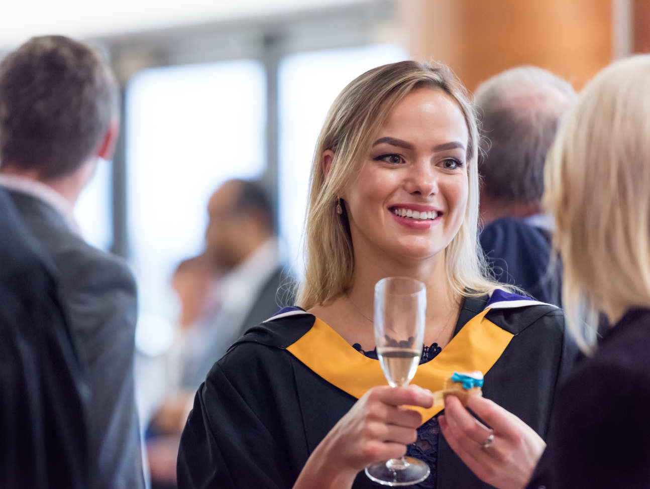 Student celebrates Graduation at reception