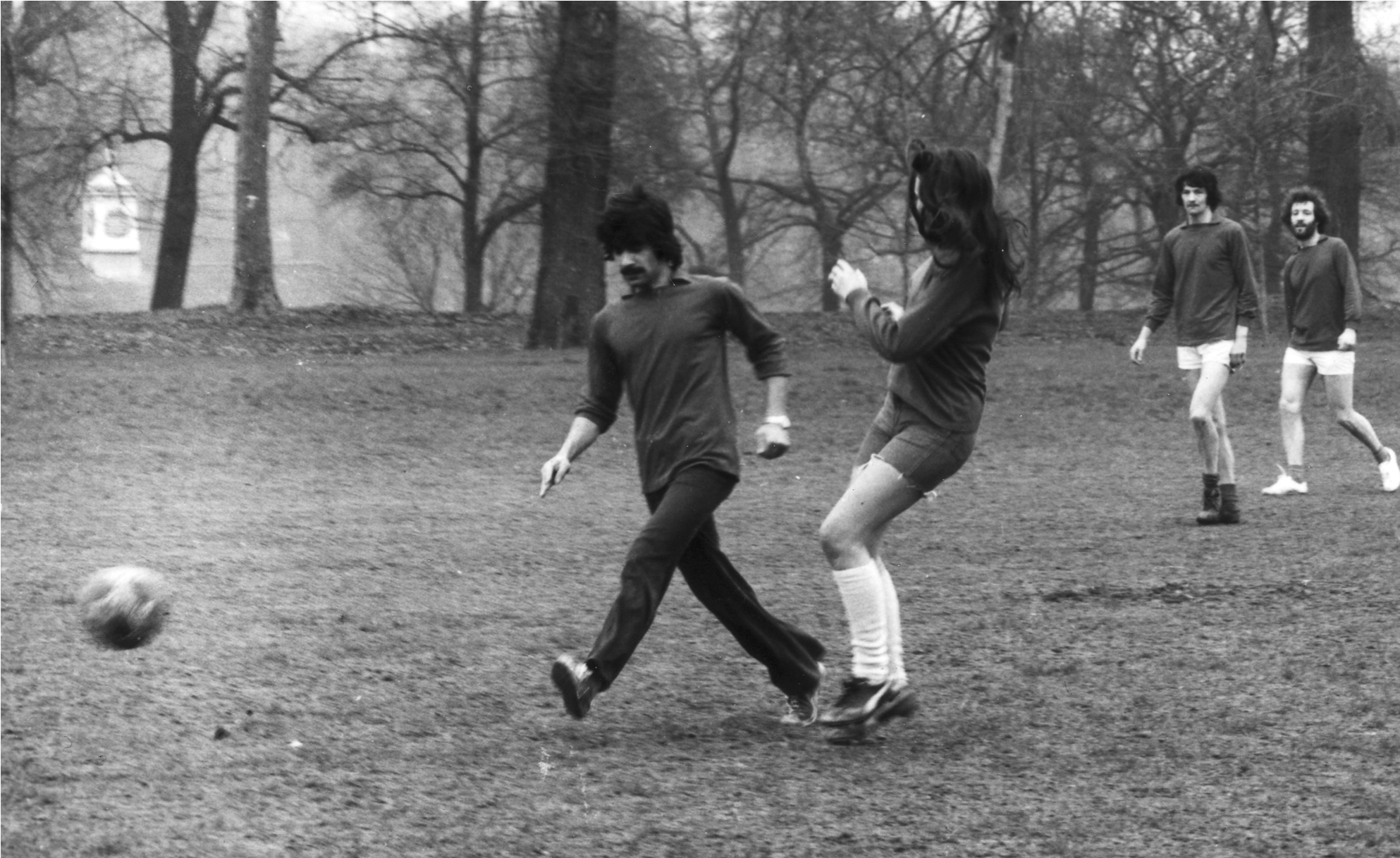 Linda playing in the football match, departmental secretaries versus postgrad students. 