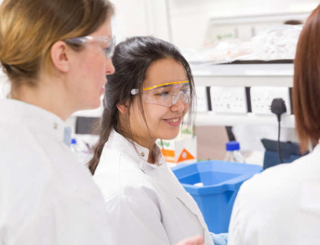 Female students in a lab