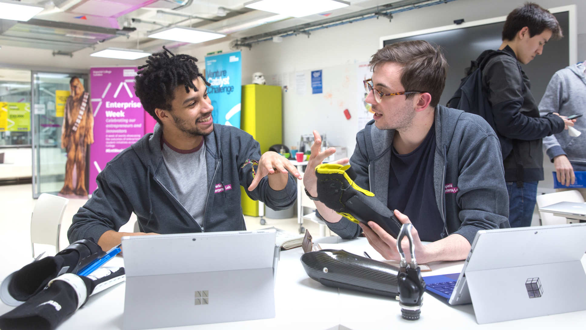 Students Nate Macabuag and Josh Chidwick discuss their prototype prosthetic limb in the Enterprise Lab