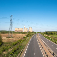 Empty motorway leading to power plant