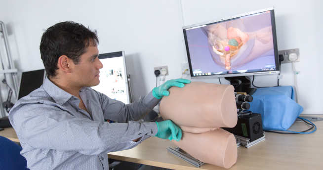Haptic rectal examination trainer in use
