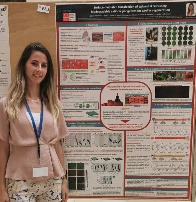 Liliana stands next to research poster
