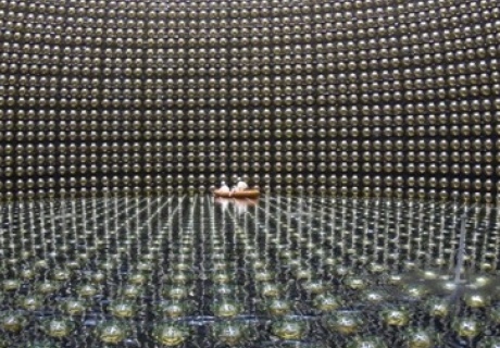 Physicists working inside the Super Kamiokande neutrino detector in Japan