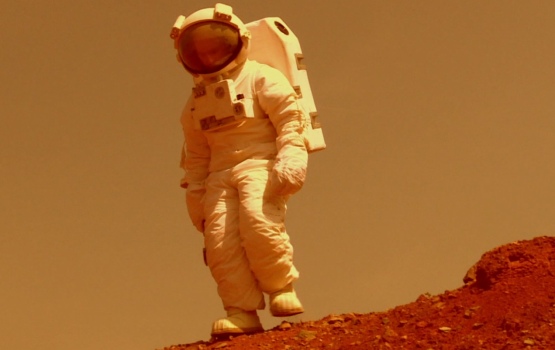 Professor Mark Sephton demonstrating how astronauts would explore on Mars