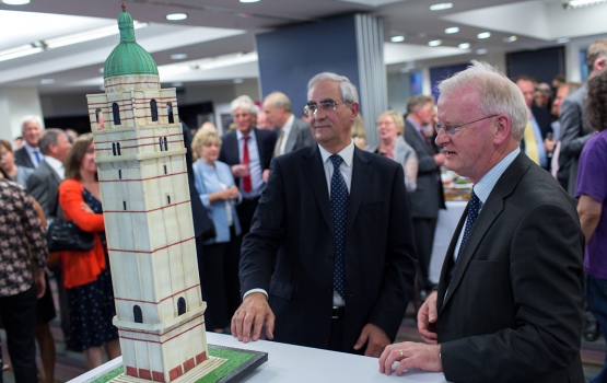 President Sir Keith and Provost Professor James Stirling inspect the Queen's Tower cake