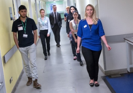 Pupils are given a tour of the animal house by Imperial staff