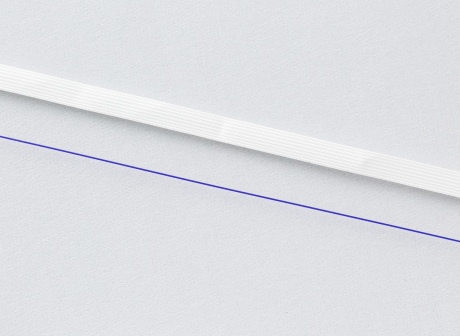 The thicker surgical thread (top) compared to the thinner thread (bottom - in blue)