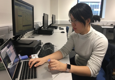 Yuhua Gu at her computer