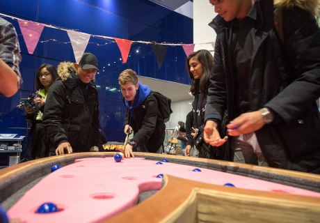 A friendly game of pool on our lung shaped table was used to teach guests about gene therapy