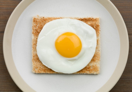 A fried egg on a piece of toast