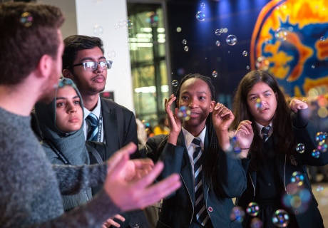 Bubbles are used to explain to visitors how air pollution spreads