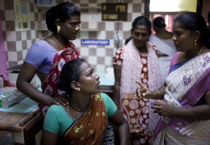 Transgender sex workers counsel other sex workers about HIV/AIDS. Photo: Sanjit Das for Avahan, The Bill & Melinda Gates Foundation.