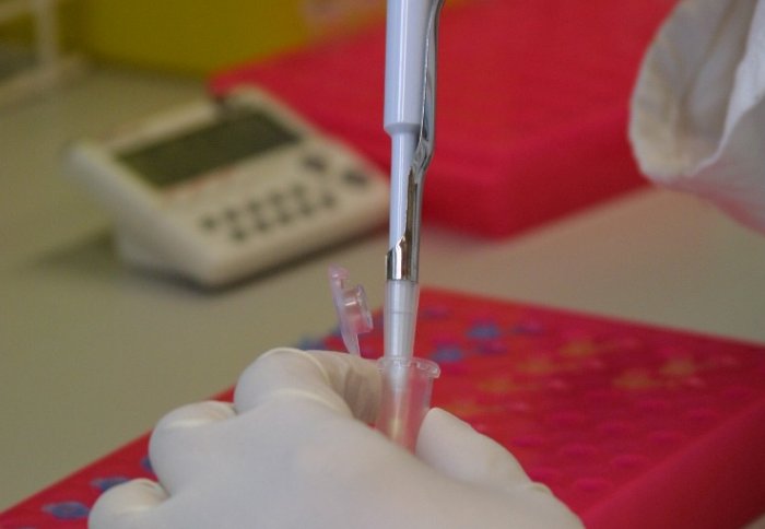 Scientist preparing an ampule