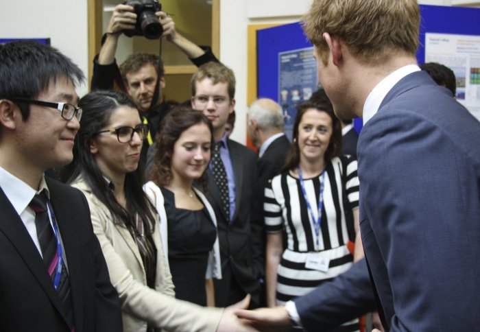 Dr Chiara Bo shakes hands with HRH Prince Harry at TRBL CBIS event