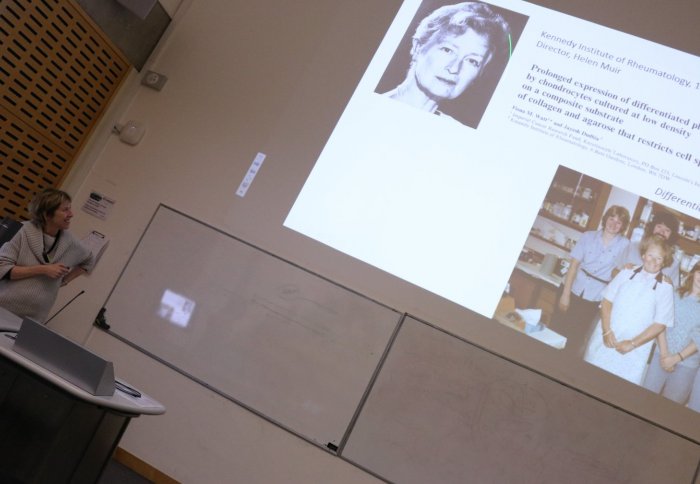 Prof Watt looks at projected slide