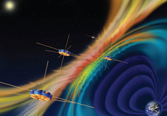 Illustration of spacecraft flying near the boundaries between two magnetic fields