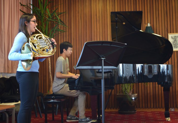 Hannah Takahashi on the French horn accompanied by Cyrus Cheng on the piano.