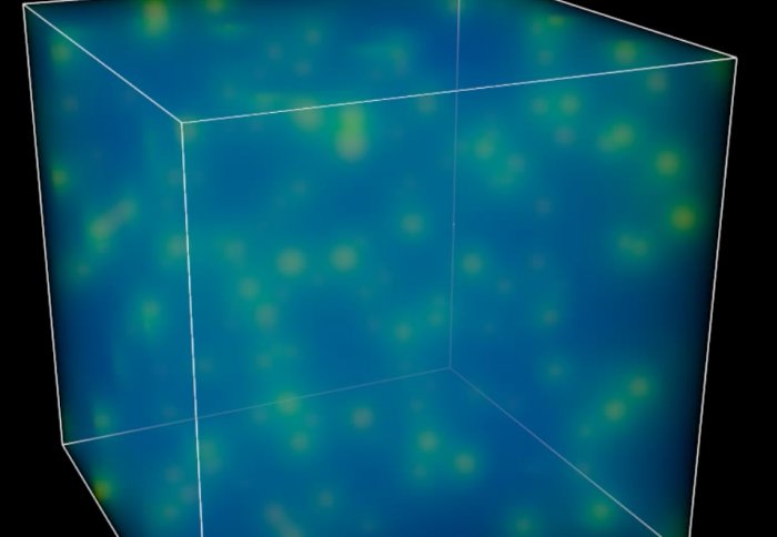 A blue cube with green blobs scattered throughout
