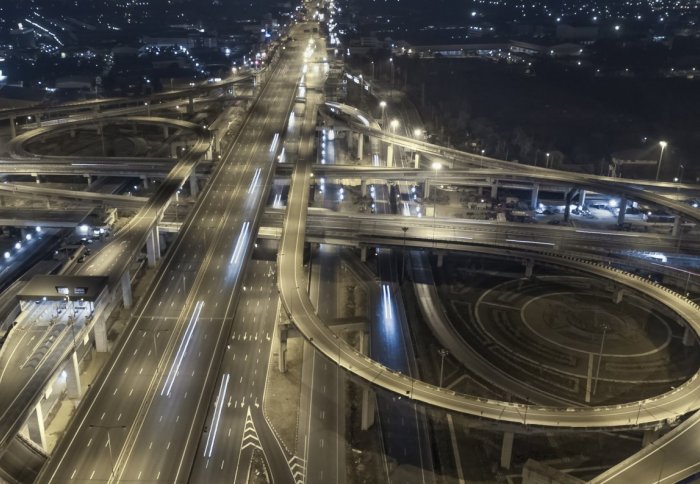 Huge freeway junction with roads spiraling in all directions