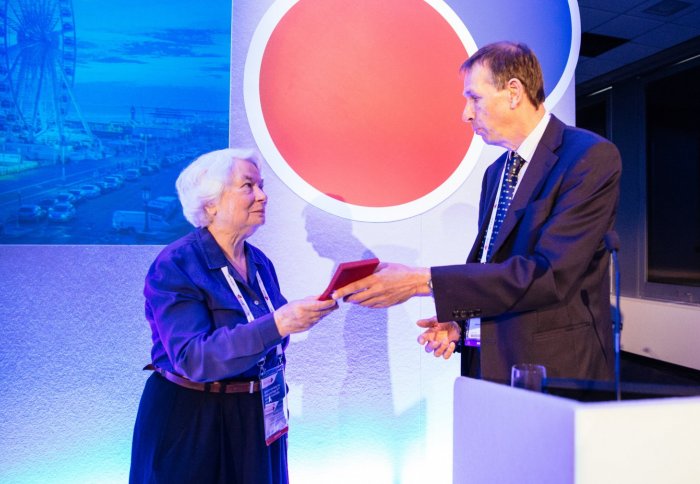 Professor Barbara Bain (left) receives the award from Dr Tim Littlewood, president of the British Society for Haematology