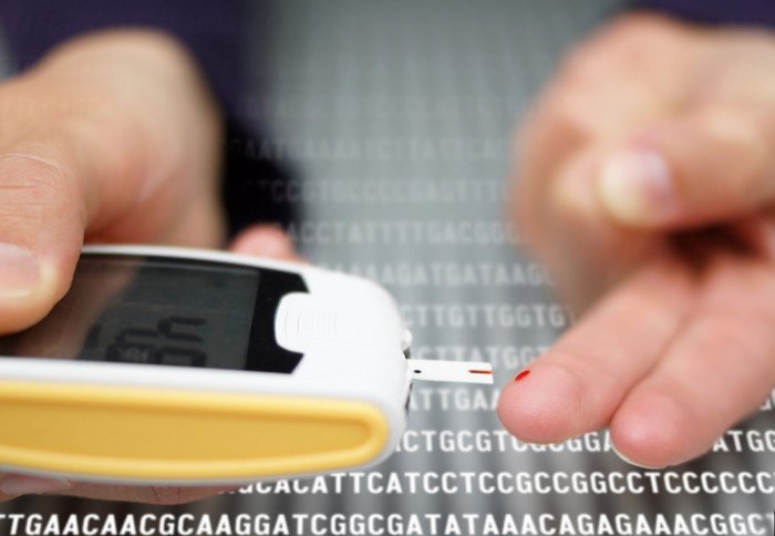 Close up photo of diabetes patient using a glucose monitor