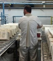 Worker in a ceramic factory