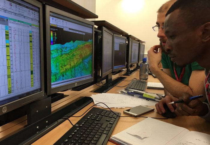 Petroleum MSc students work at a computer