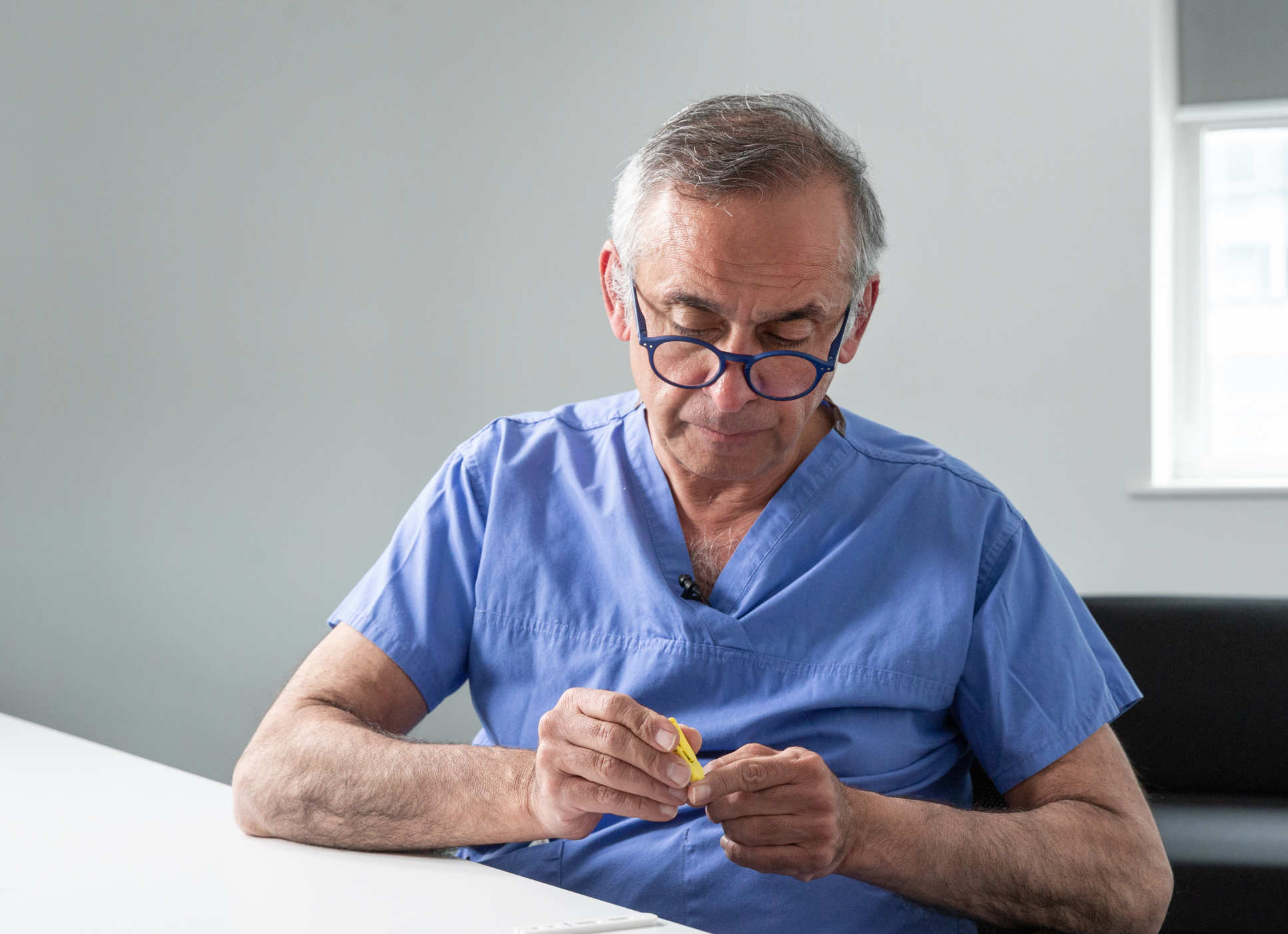 Lord Darzi demonstrating the fingerprick COVID-19 test