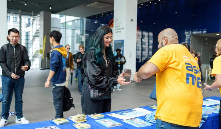 Photo of a student and staff