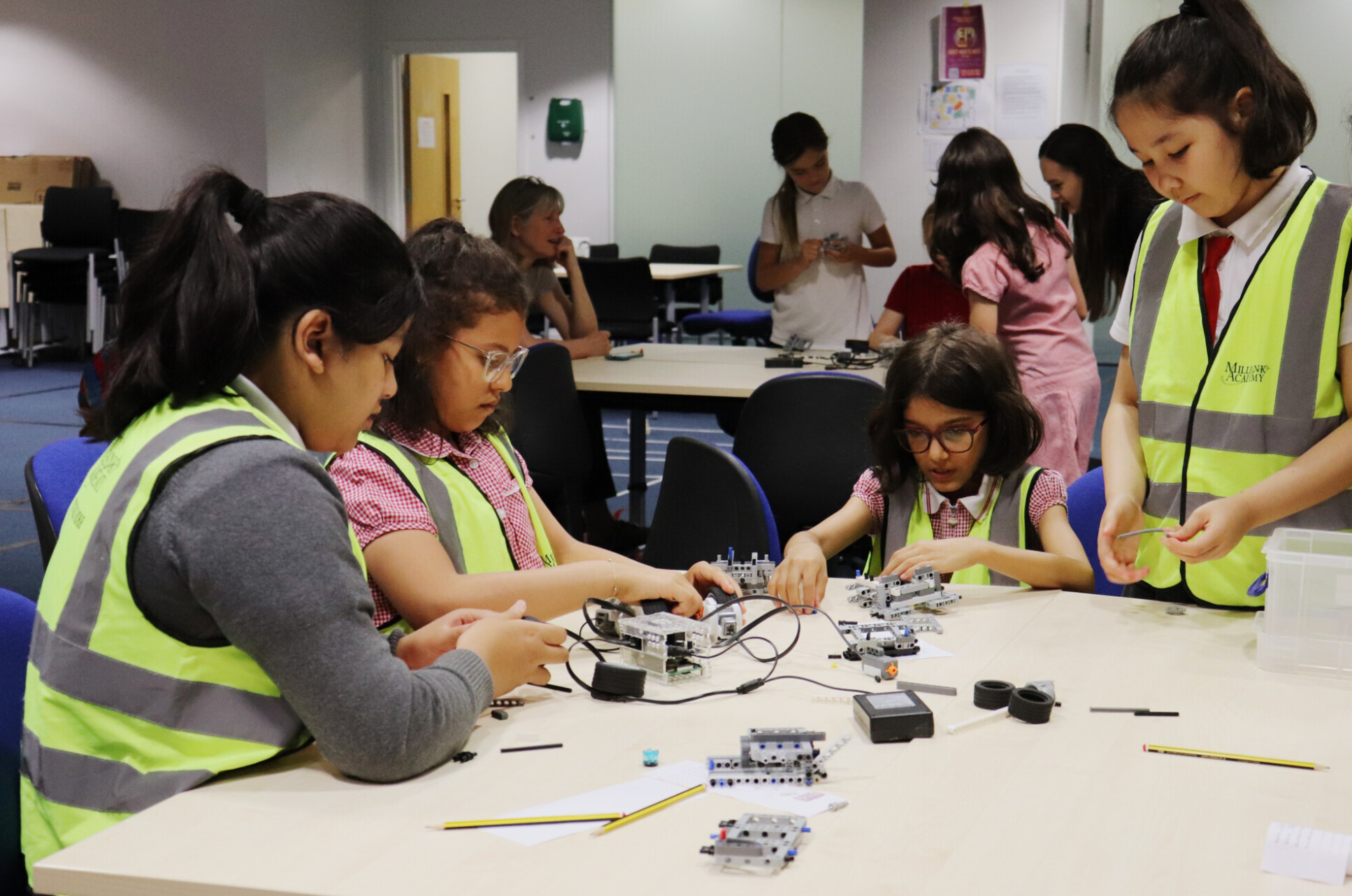 Young girls involved in computing activities
