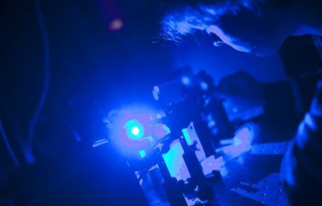 Scientist using blue lasers