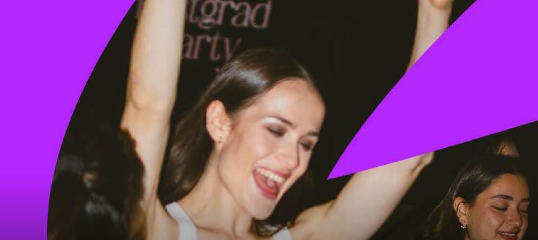 Woman dancing at Postgrad Party 2025