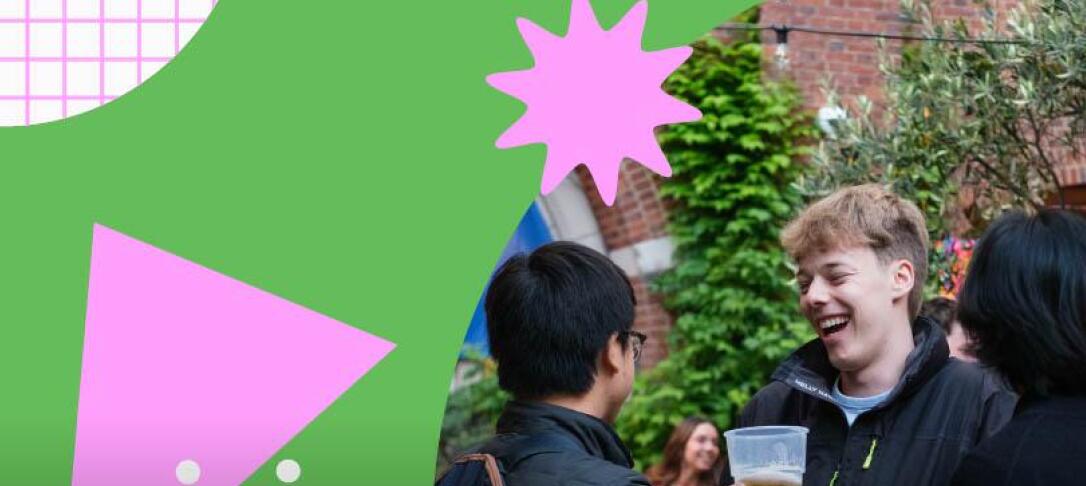 Students smiling and socialising in Beit Quad